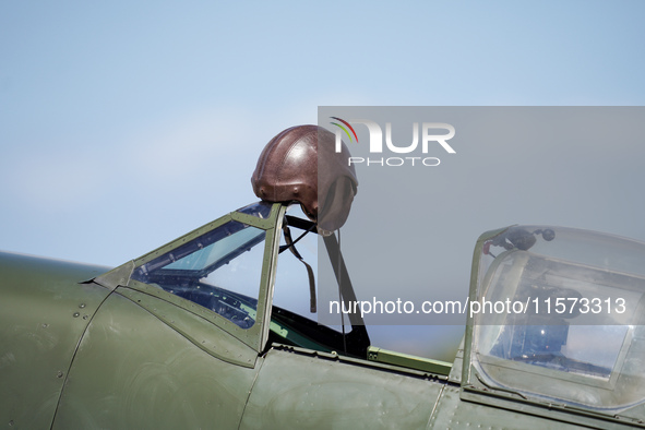 A helmet hangs in the cockpit during the Athens Flying Show in Tanagra, Greece, on September 14, 2024 