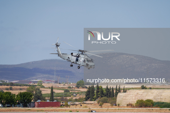 A helicopter performs demonstrations during the Athens Flying Show in Tanagra, Greece, on September 14, 2024 