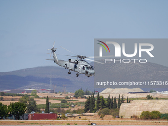 A helicopter performs demonstrations during the Athens Flying Show in Tanagra, Greece, on September 14, 2024 (