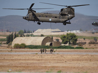 A Boeing CH-47 Chinook helicopter performs demonstrations during the Athens Flying Show in Tanagra, Greece, on September 14, 2024. (