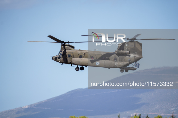 A Boeing CH-47 Chinook helicopter performs demonstrations during the Athens Flying Show in Tanagra, Greece, on September 14, 2024. 