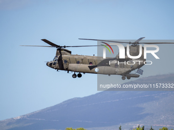 A Boeing CH-47 Chinook helicopter performs demonstrations during the Athens Flying Show in Tanagra, Greece, on September 14, 2024. (