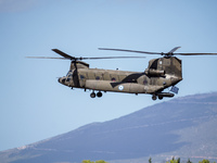 A Boeing CH-47 Chinook helicopter performs demonstrations during the Athens Flying Show in Tanagra, Greece, on September 14, 2024. (