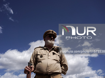 Members of the Greek Army reenact a WWII scene during the Athens Flying Show in Athens, Greece, on September 14, 2024 (