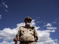 Members of the Greek Army reenact a WWII scene during the Athens Flying Show in Athens, Greece, on September 14, 2024 (