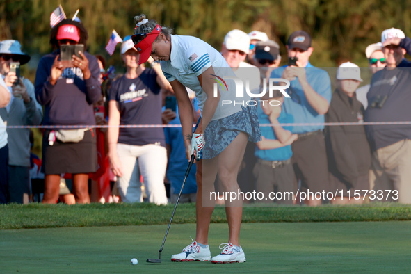 GAINESVILLE, VIRGINIA - SEPTEMBER 14: Lexi Thompson of the United States putts on the 2nd green during Day Two of the Solheim Cup at Robert...