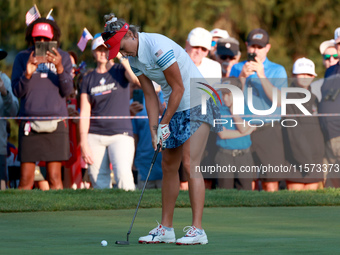 GAINESVILLE, VIRGINIA - SEPTEMBER 14: Lexi Thompson of the United States putts on the 2nd green during Day Two of the Solheim Cup at Robert...