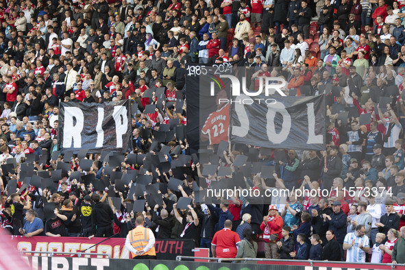 Fans pay tribute to Sol Bamba during the Sky Bet Championship match between Middlesbrough and Preston North End at the Riverside Stadium in...