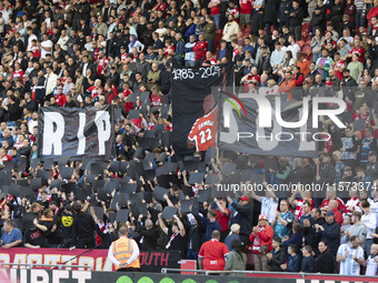 Fans pay tribute to Sol Bamba during the Sky Bet Championship match between Middlesbrough and Preston North End at the Riverside Stadium in...