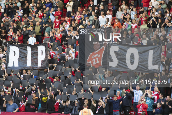 Fans pay tribute to Sol Bamba during the Sky Bet Championship match between Middlesbrough and Preston North End at the Riverside Stadium in...