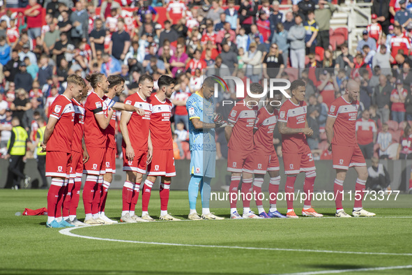 Middlesbrough players applaud during a tribute to Sol Bemba during the Sky Bet Championship match between Middlesbrough and Preston North En...