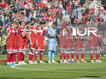 Middlesbrough players applaud during a tribute to Sol Bemba during the Sky Bet Championship match between Middlesbrough and Preston North En...