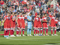 Middlesbrough players applaud during a tribute to Sol Bemba during the Sky Bet Championship match between Middlesbrough and Preston North En...