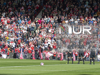 Middlesbrough and Preston players, along with the officials, applaud during a tribute to Sol Bemba during the Sky Bet Championship match bet...