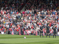 Middlesbrough and Preston players, along with the officials, applaud during a tribute to Sol Bemba during the Sky Bet Championship match bet...