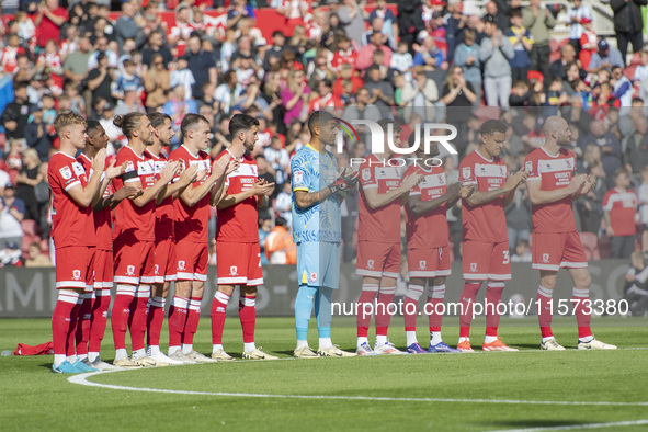 Middlesbrough players applaud during a tribute to Sol Bemba during the Sky Bet Championship match between Middlesbrough and Preston North En...