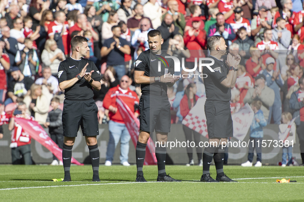 Officials applaud during a tribute to Sol Bemba during the Sky Bet Championship match between Middlesbrough and Preston North End at the Riv...