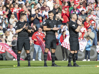 Officials applaud during a tribute to Sol Bemba during the Sky Bet Championship match between Middlesbrough and Preston North End at the Riv...