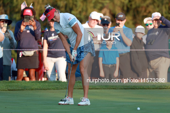 GAINESVILLE, VIRGINIA - SEPTEMBER 14: Lexi Thompson of the United States putts on the 2nd green during Day Two of the Solheim Cup at Robert...