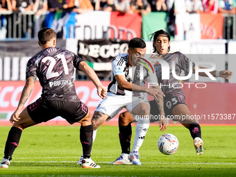 Youssef Maleh of Empoli FC and Nicolas Gonzalez of Juventus FC compete for the ball during the Serie A Enilive match between Empoli FC and J...