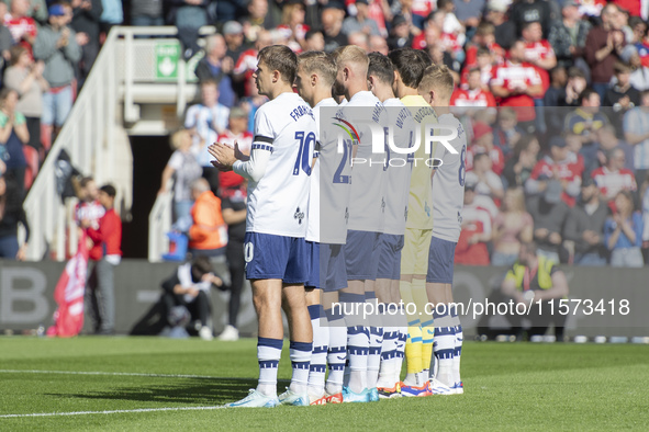 Preston North End players applaud during a tribute to Sol Bemba during the Sky Bet Championship match between Middlesbrough and Preston Nort...