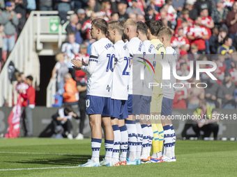 Preston North End players applaud during a tribute to Sol Bemba during the Sky Bet Championship match between Middlesbrough and Preston Nort...