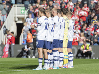 Preston North End players applaud during a tribute to Sol Bemba during the Sky Bet Championship match between Middlesbrough and Preston Nort...