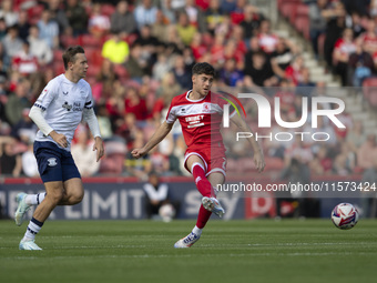 Middlesbrough's Hayden Hackney passes the ball forward during the Sky Bet Championship match between Middlesbrough and Preston North End at...