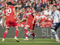 Middlesbrough's Hayden Hackney looks to pass the ball forward during the Sky Bet Championship match between Middlesbrough and Preston North...