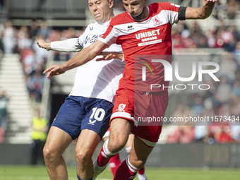 Middlesbrough's Dan Barlaser goes down under a heavy challenge from Preston North End's Mads Frokjaer-Jensen during the Sky Bet Championship...