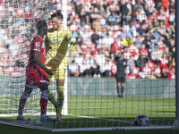 Preston North End goalkeeper Freddie Woodman clashes with Middlesbrough's Emmanuel Latte Lath during the Sky Bet Championship match between...