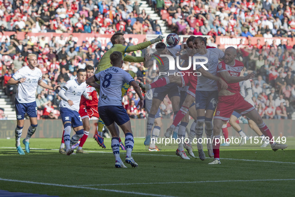 Preston North End goalkeeper Freddie Woodman punches the ball under pressure during the Sky Bet Championship match between Middlesbrough and...