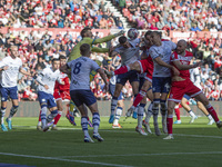 Preston North End goalkeeper Freddie Woodman punches the ball under pressure during the Sky Bet Championship match between Middlesbrough and...