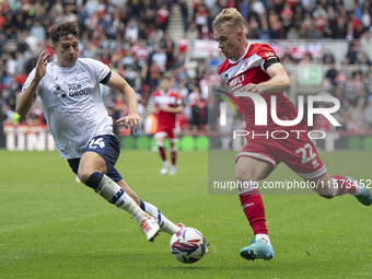 Tommy Conway of Middlesbrough takes on Jordan Storey of Preston North End during the Sky Bet Championship match between Middlesbrough and Pr...