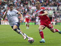 Tommy Conway of Middlesbrough takes on Jordan Storey of Preston North End during the Sky Bet Championship match between Middlesbrough and Pr...