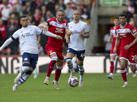 Luke Ayling of Middlesbrough takes on Sam Greenwood of Preston North End during the Sky Bet Championship match between Middlesbrough and Pre...