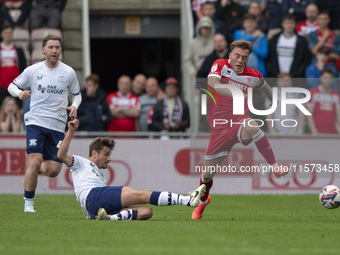 Middlesbrough's Aidan Morris is fouled while driving forward during the Sky Bet Championship match between Middlesbrough and Preston North E...