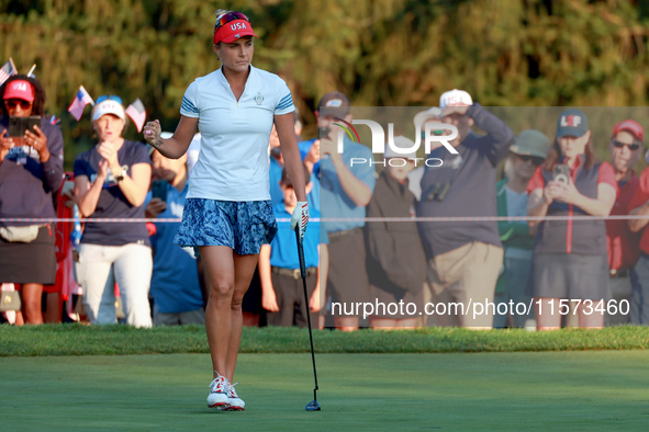 GAINESVILLE, VIRGINIA - SEPTEMBER 14: Lexi Thompson of the United States reacts to her putt on the 2nd green during Day Two of the Solheim C...