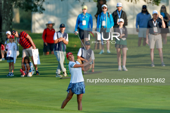 GAINESVILLE, VIRGINIA - SEPTEMBER 14: Lexi Thompson of the United States hits from the 3rd fairway during Day Two of the Solheim Cup at Robe...