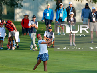 GAINESVILLE, VIRGINIA - SEPTEMBER 14: Lexi Thompson of the United States hits from the 3rd fairway during Day Two of the Solheim Cup at Robe...