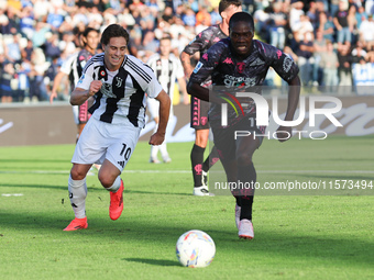 Emmanuel Gyasi of Empoli FC and Kenan Yildiz of Juventus FC battle for the ball during the Serie A match between Empoli FC and Juventus FC i...