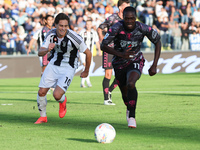 Emmanuel Gyasi of Empoli FC and Kenan Yildiz of Juventus FC battle for the ball during the Serie A match between Empoli FC and Juventus FC i...