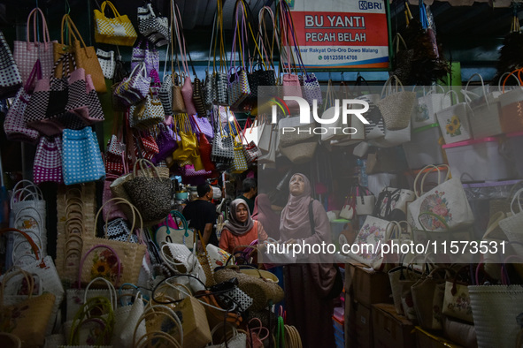 A stall sells handicraft products at Oro Oro Dowo traditional market in Malang, East Java, Indonesia, on September 14, 2024. This traditiona...