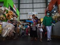 Activities of visitors and traders at Oro Oro Dowo traditional market in Malang, East Java, Indonesia, on September 14, 2024. This tradition...