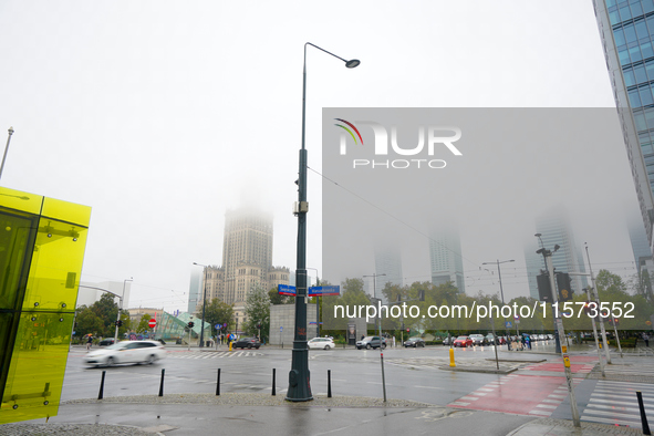 Fog is seen partly covering the city skyline in Warsaw, Poland on 14 September, 2024. Warnings for heavy rainfall and severe flooding have b...