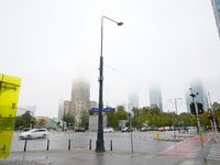 Fog is seen partly covering the city skyline in Warsaw, Poland on 14 September, 2024. Warnings for heavy rainfall and severe flooding have b...