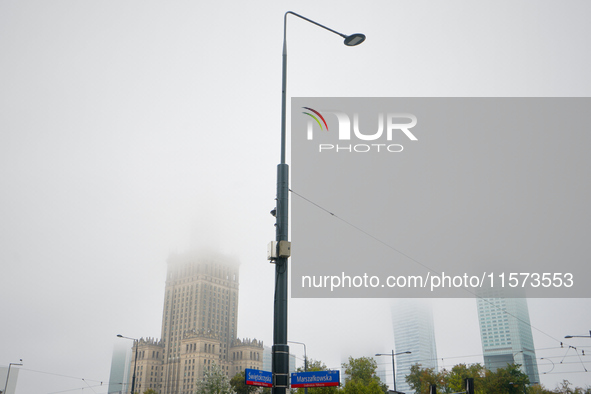 Fog is seen partly covering the city skyline in Warsaw, Poland on 14 September, 2024. Warnings for heavy rainfall and severe flooding have b...