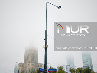 Fog is seen partly covering the city skyline in Warsaw, Poland on 14 September, 2024. Warnings for heavy rainfall and severe flooding have b...