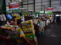 Activities of visitors and vegetable traders at Oro Oro Dowo traditional market in Malang, East Java, Indonesia, on September 14, 2024. This...