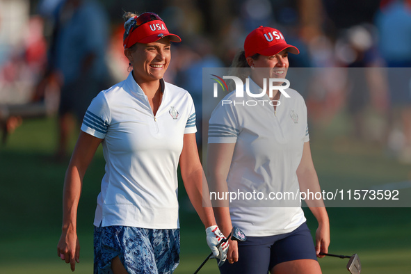 GAINESVILLE, VIRGINIA - SEPTEMBER 14: Lexi Thompson of the United States and Lauren Coughlin of the United States walk together to the 3rd g...